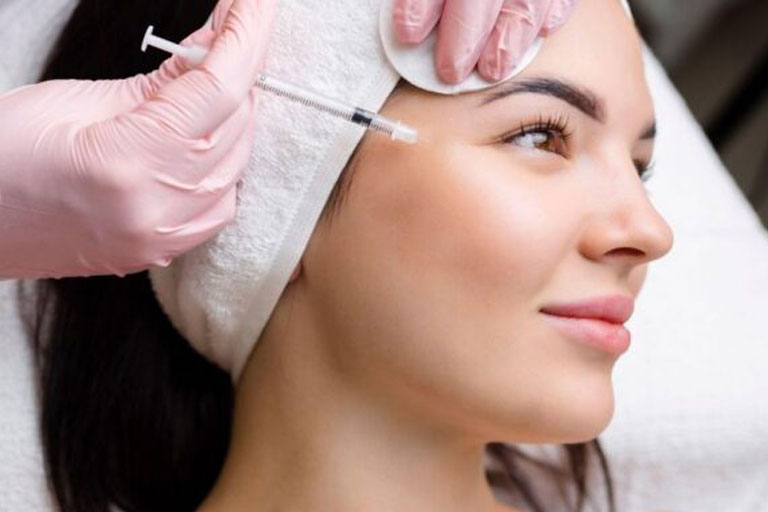 Woman receiving natural-looking Botox in Vienna, VA at Rejuvenation Clinic